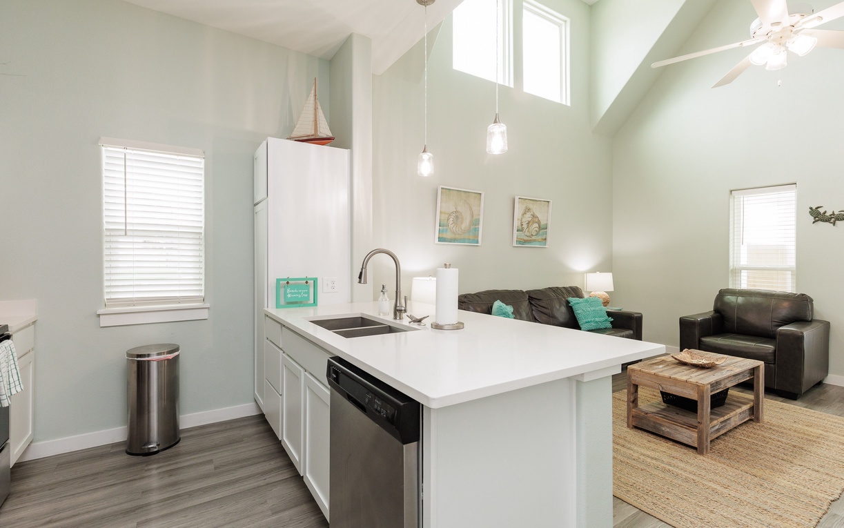 Your bright, open kitchen flows seamlessly into the cozy living area, perfect for preparing meals while staying connected with family and friends.