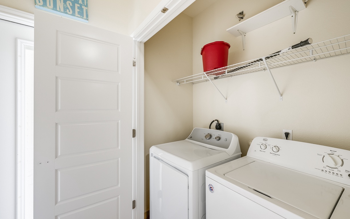 Your dedicated laundry room keeps vacation essentials fresh and clean, with convenient storage space for all your needs.