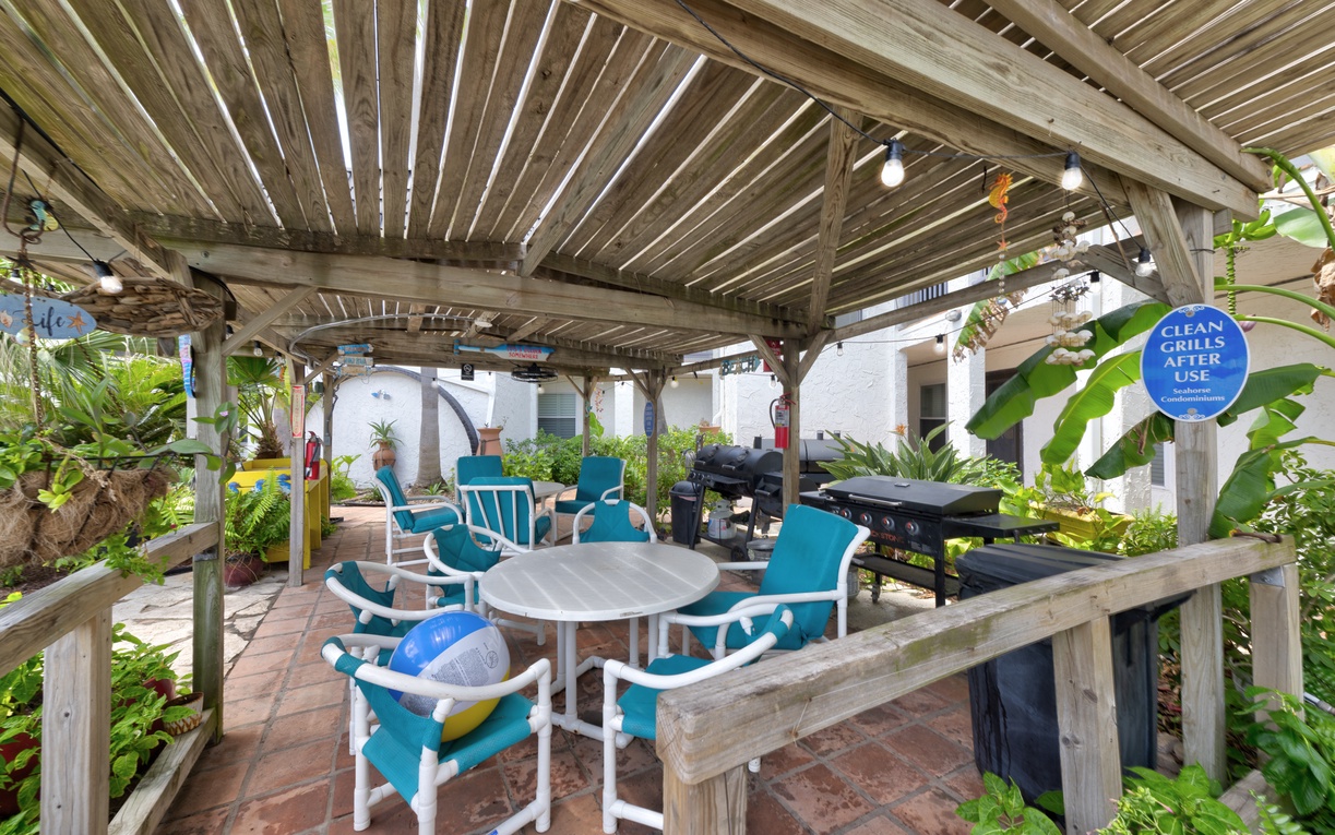 Fire up the grill and dine al fresco under your shaded pergola, surrounded by lush tropical plants and cooling ocean breezes.