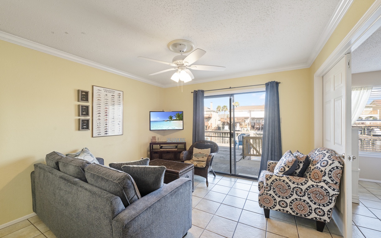 Your bright, airy living room features comfortable seating and opens to your private balcony overlooking the surrounding area.