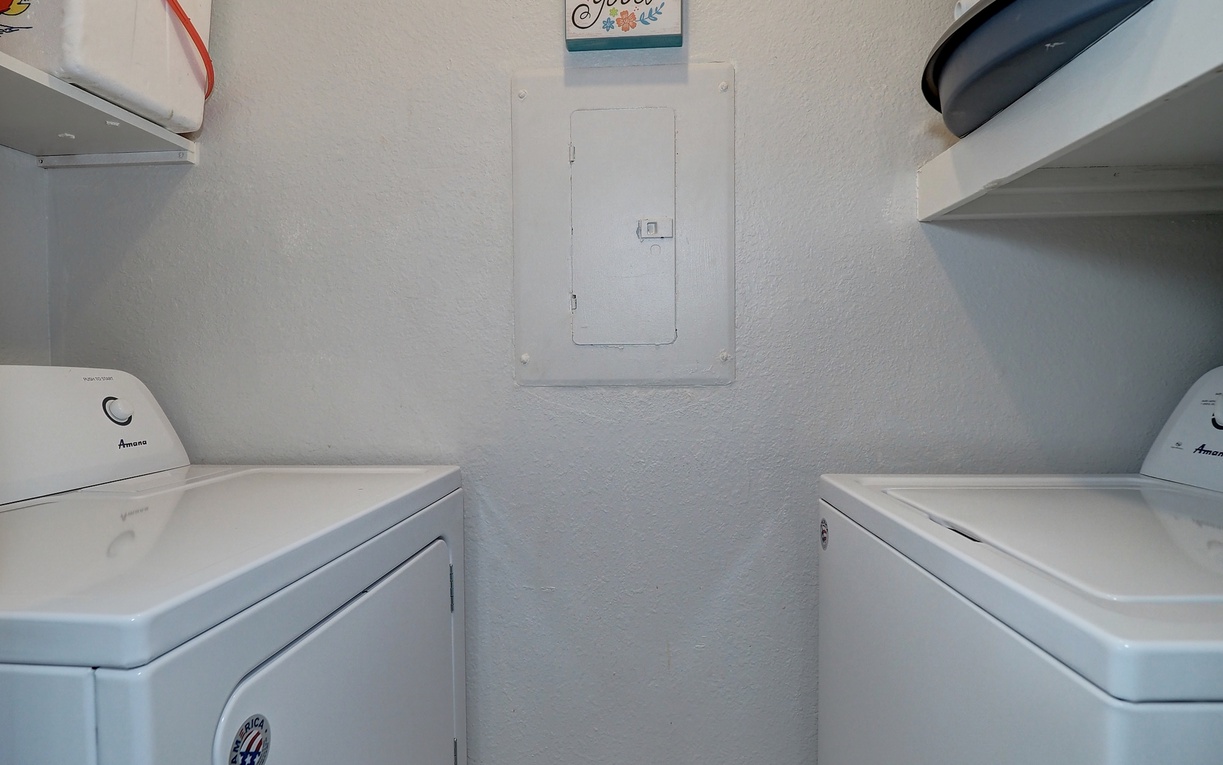 Your dedicated laundry space makes longer stays effortless with full-size washer and dryer plus convenient storage shelves for supplies.