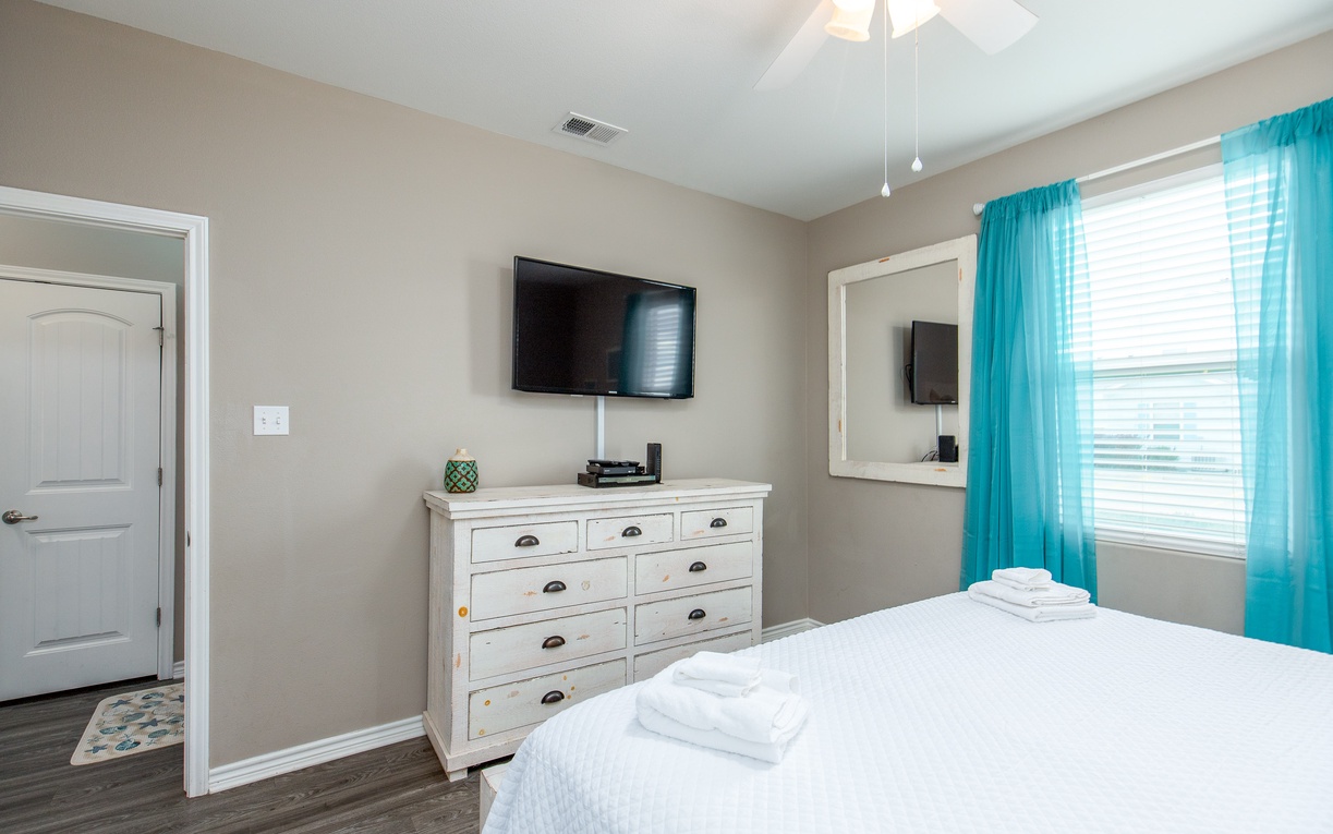 Unwind in your bright bedroom with crisp linens, entertainment center, and plenty of storage for all your belongings.