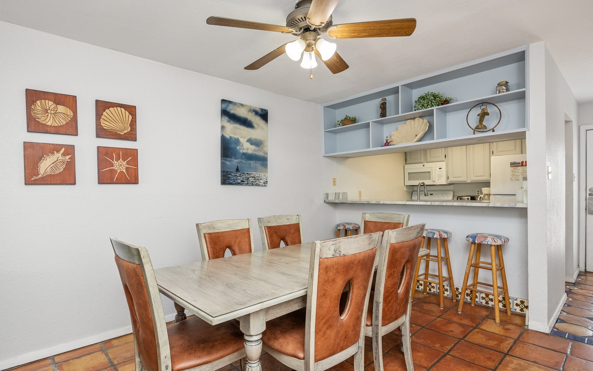 Gather around this spacious dining table with comfortable seating for eight, where your group can enjoy meals together.