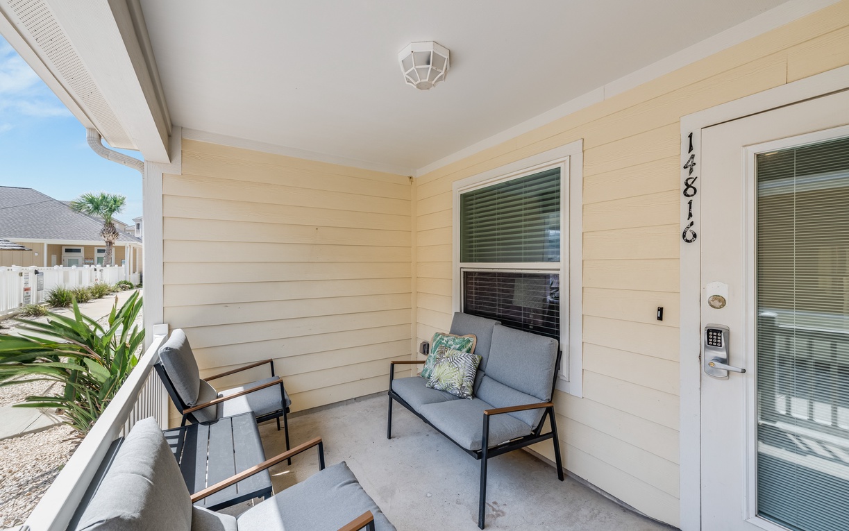 Settle into your private balcony with cozy seating and tropical views for peaceful mornings or evening relaxation.