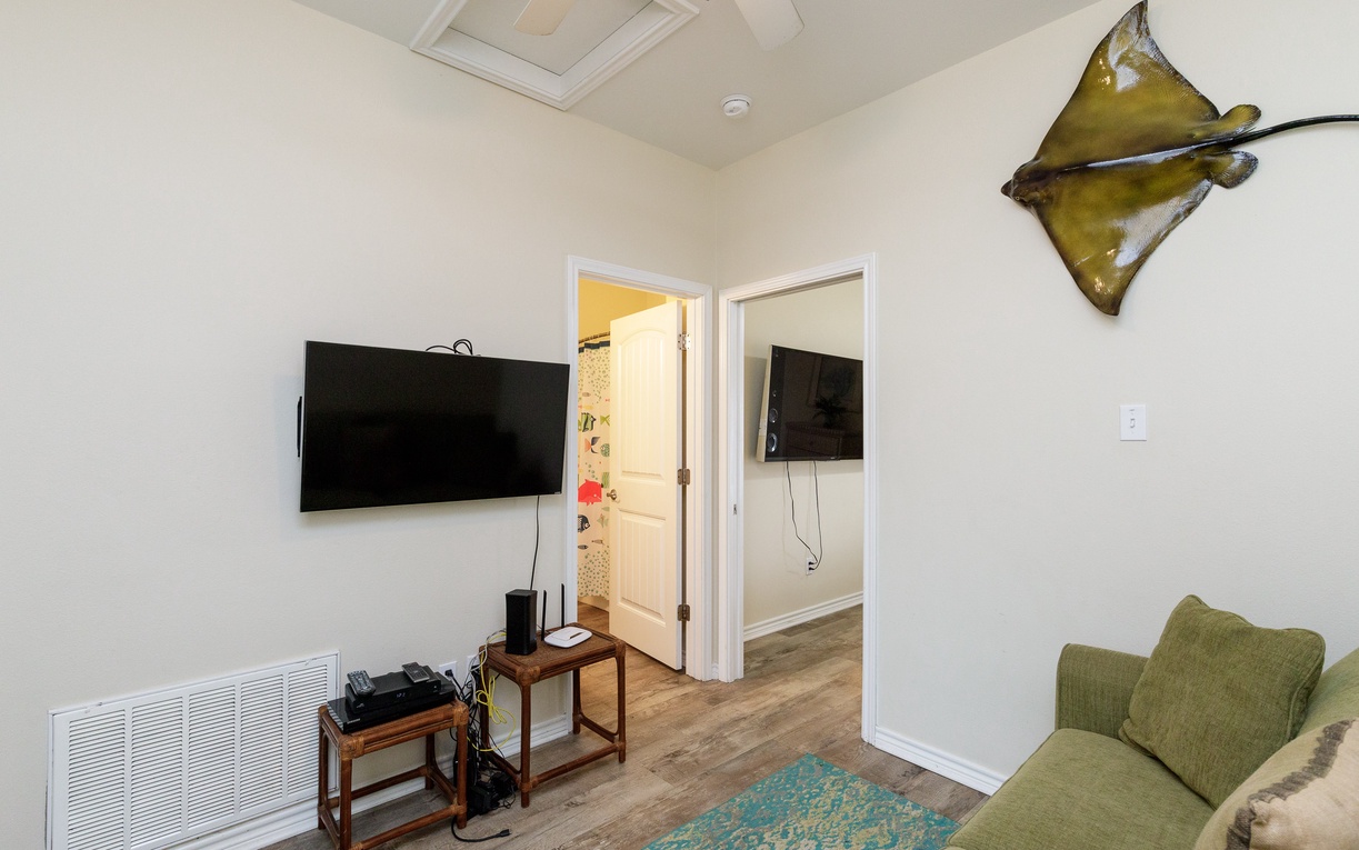 Relax in your bright living space with flat-screen TV and comfortable seating for unwinding after exploring.