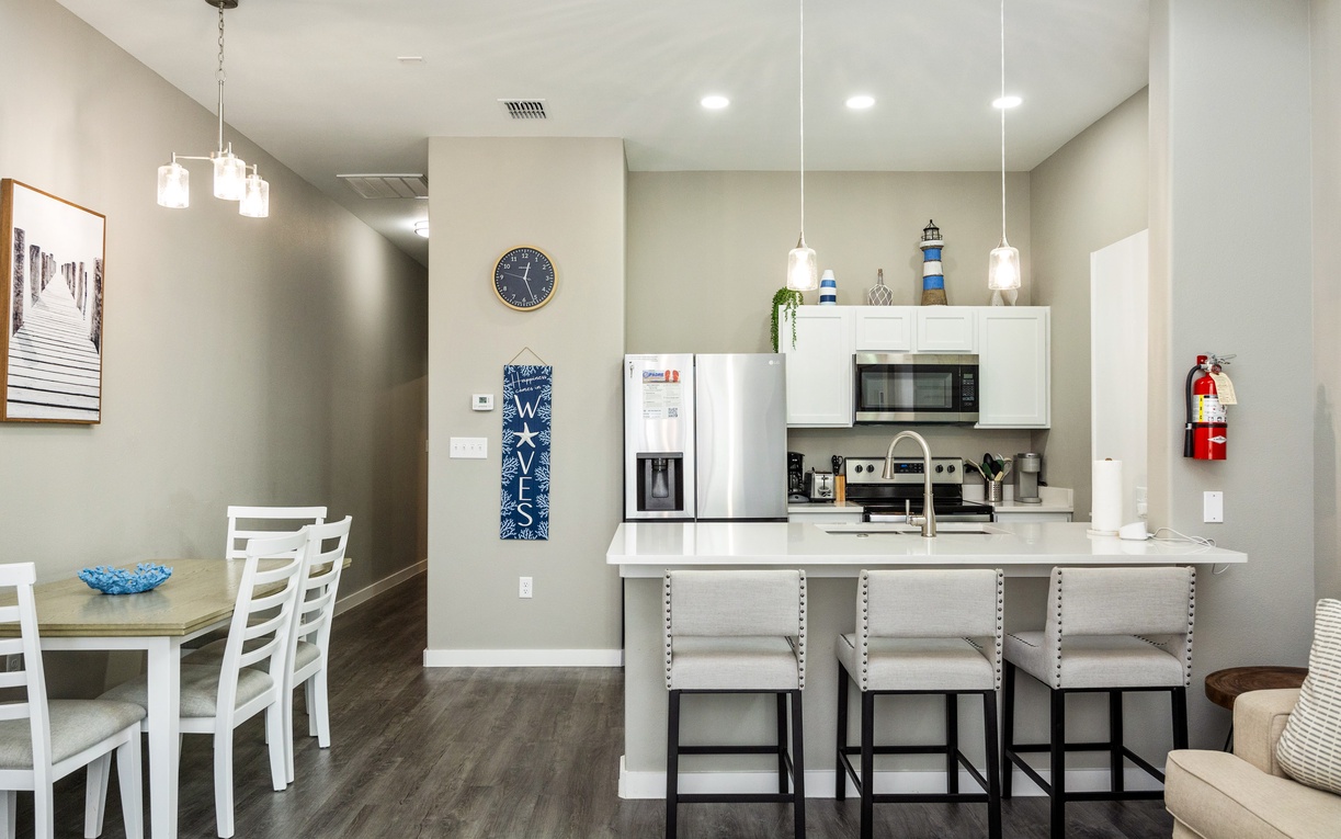 Your modern kitchen island becomes the heart of your stay, perfect for morning coffee or evening meals with loved ones.