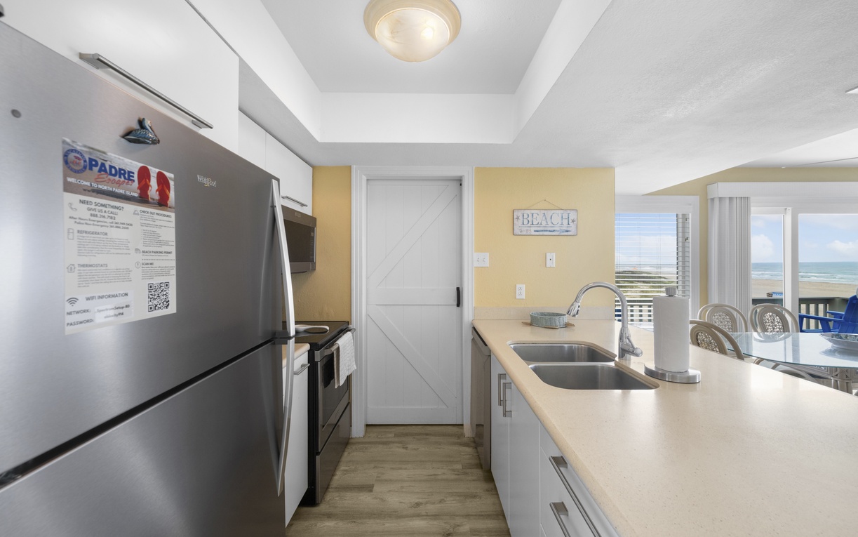 Your open-concept kitchen is made for entertaining, with sleek stainless steel appliances, generous counter space, and an easy flow into the dining area—perfect for gathering, cooking, and connecting.