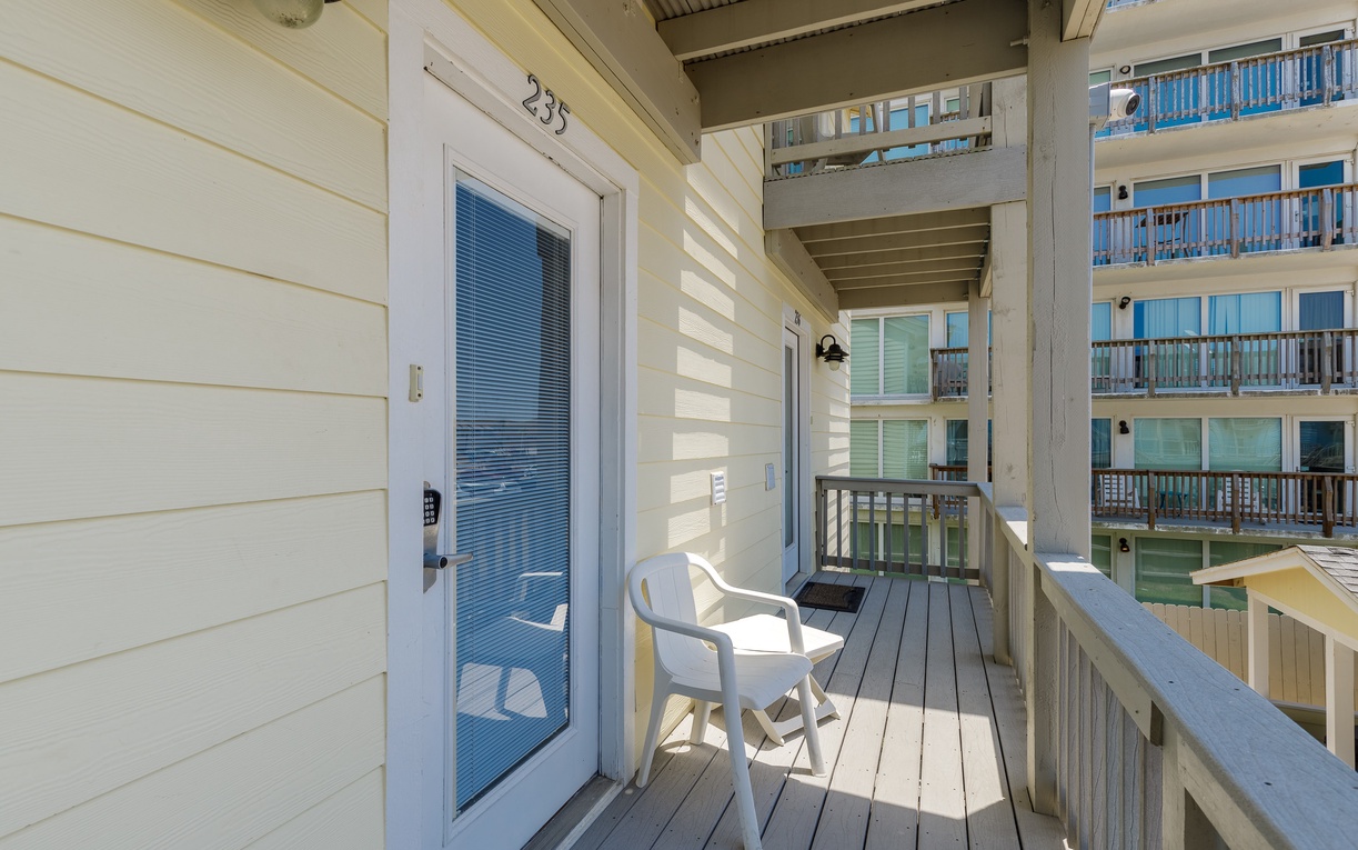 Front door entryway with coded lock for added security.