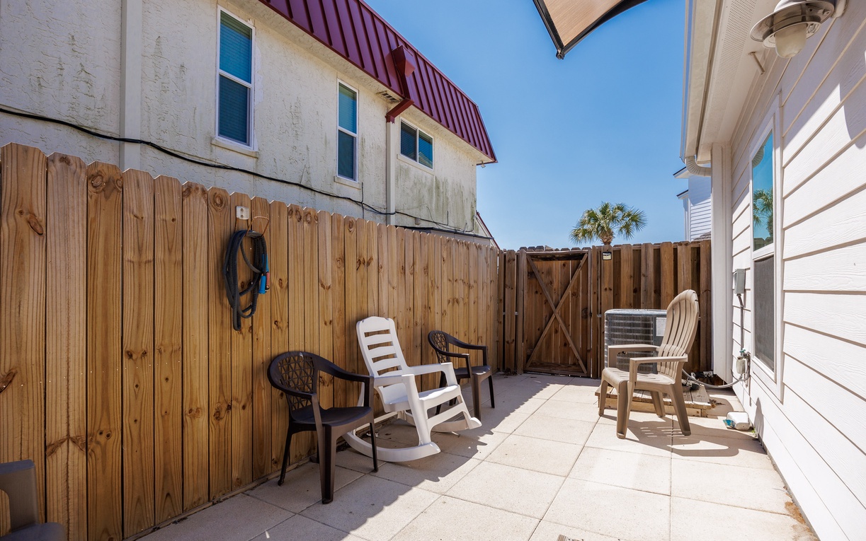 Your private patio offers peaceful outdoor seating where you can sip morning coffee or unwind with evening drinks under the open sky.