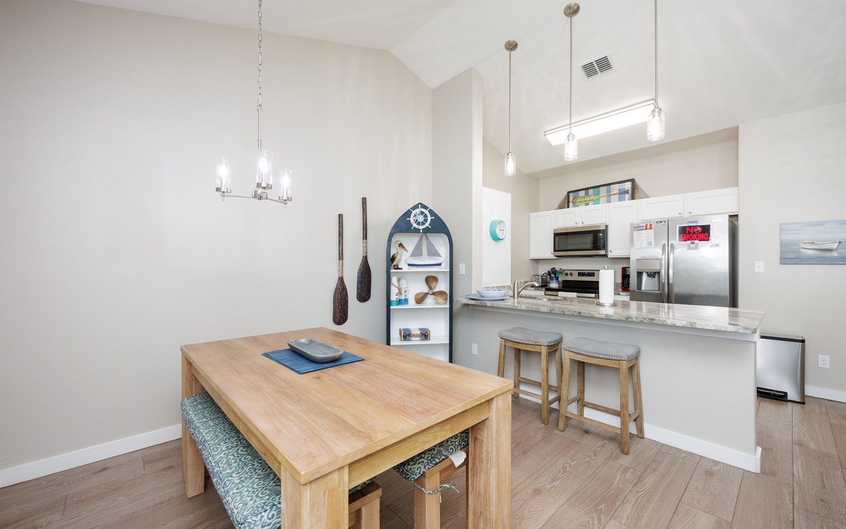 Your open-concept kitchen flows seamlessly into the dining area, perfect for gathering with loved ones over home-cooked meals.