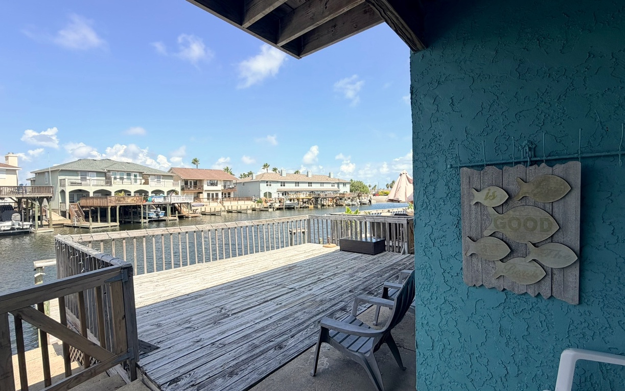 Step onto your private waterfront deck and soak in stunning canal views while lounging at your outdoor dining set.