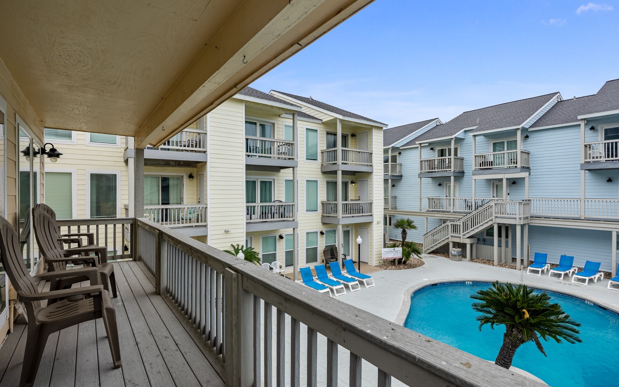 Your private balcony overlooks the sparkling pool area, where you can watch the sun dance on the water while enjoying your morning coffee.