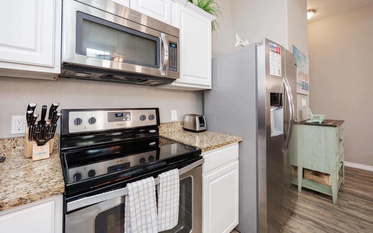 Your fully equipped kitchen features stainless steel appliances, granite counters, and everything needed for home-cooked meals during your stay.