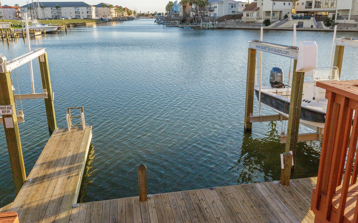 Waterfront canal community with private boat slip (no boat lift available).