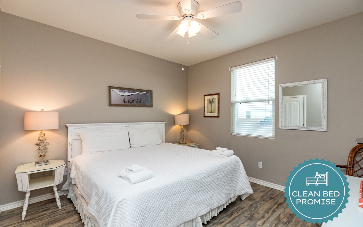 Drift off in this peaceful bedroom featuring a cozy bed, gentle lighting, and calming decor that creates your perfect retreat.