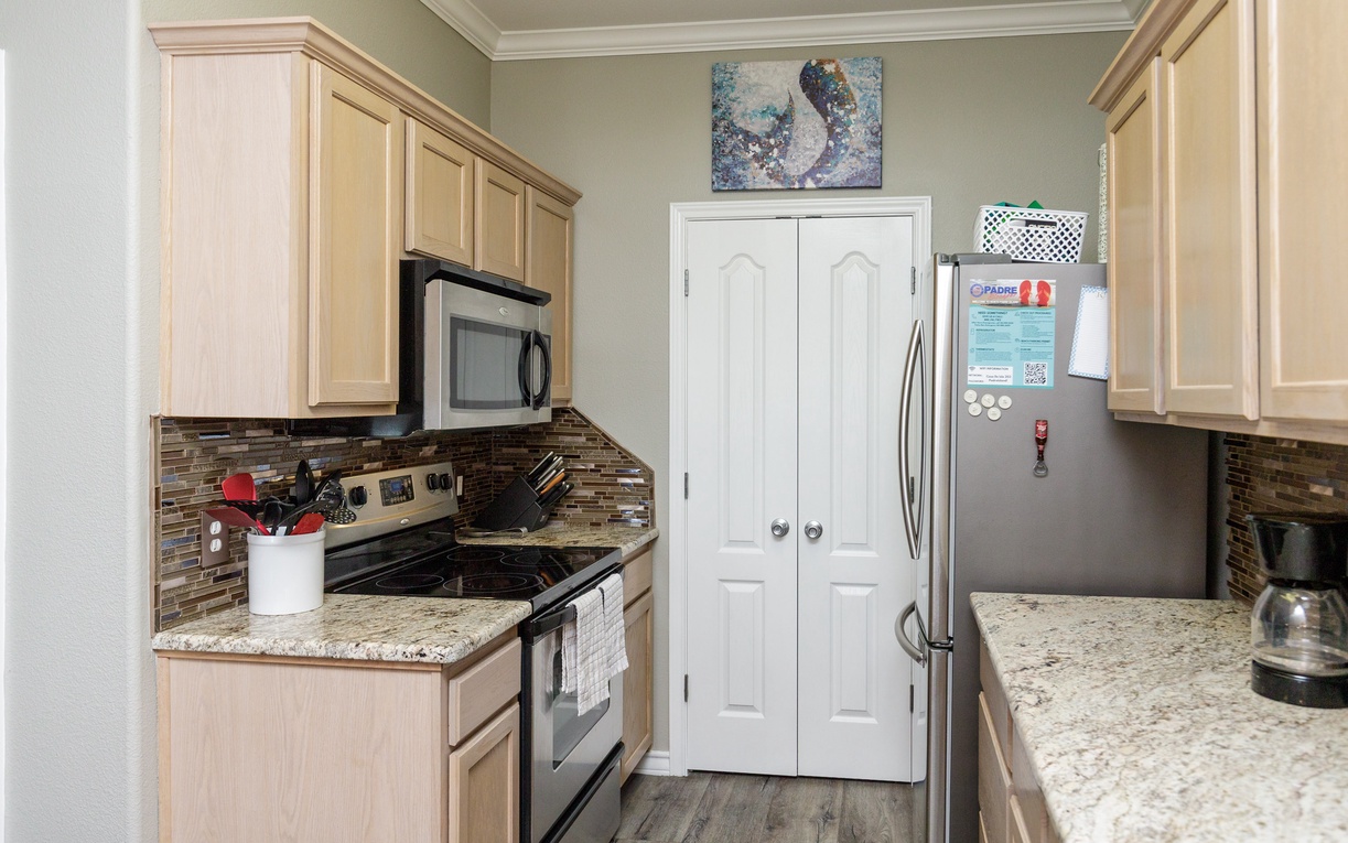 Your fully equipped kitchen features granite countertops, stainless steel appliances, and everything you need to create delicious meals during your stay.