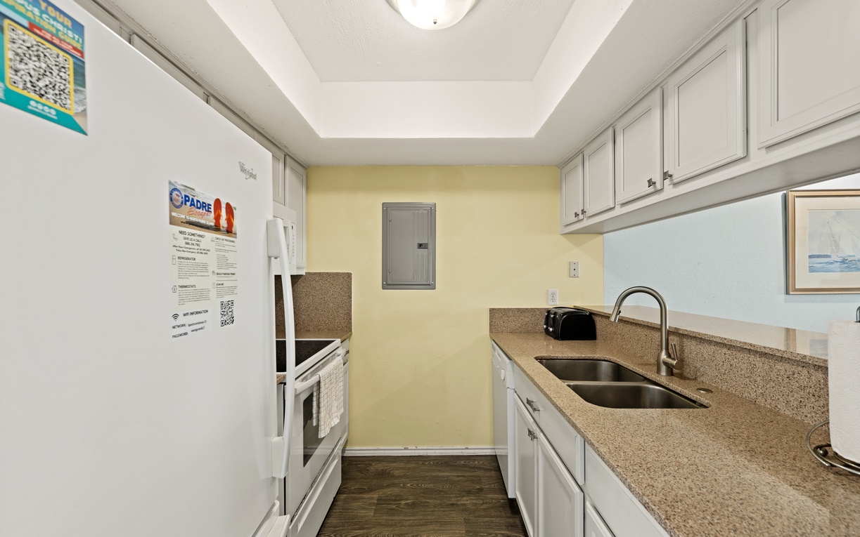 Your fully equipped kitchen awaits with everything you need to prepare meals during your stay. Ample counter space, a double sink, and modern appliances make cooking a breeze.