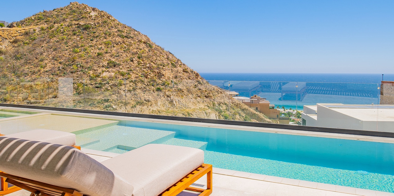 Private pool with stunning sea and mountain views overlooking the Mediterranean coastline.