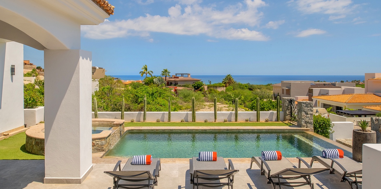 Sunny poolside with oceanview -1