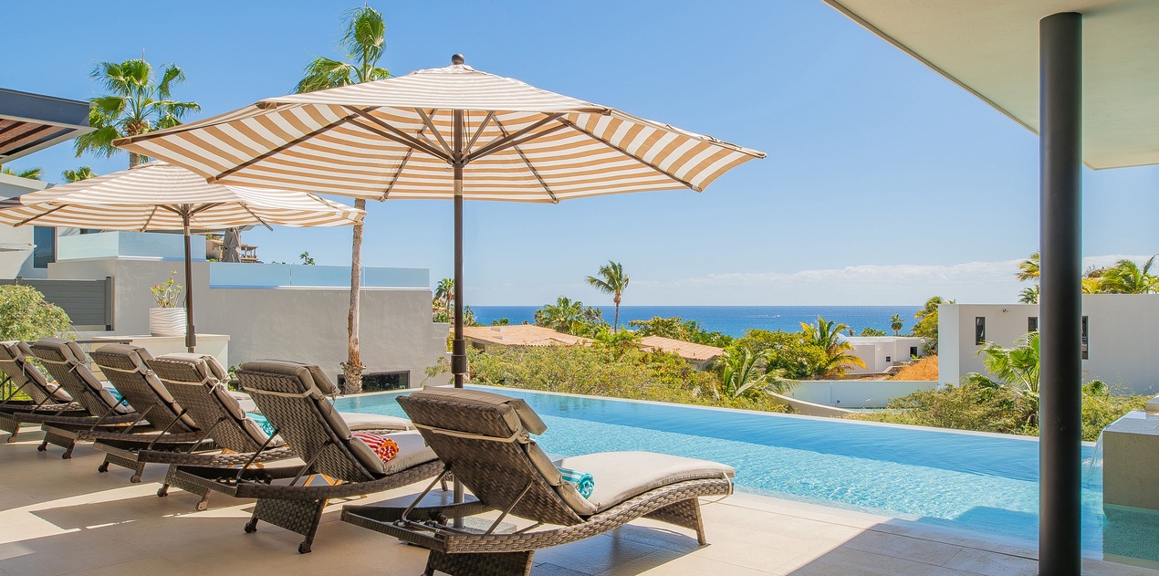 Soak up the tropical paradise from your private infinity pool terrace, where ocean views and swaying palms create the perfect retreat.