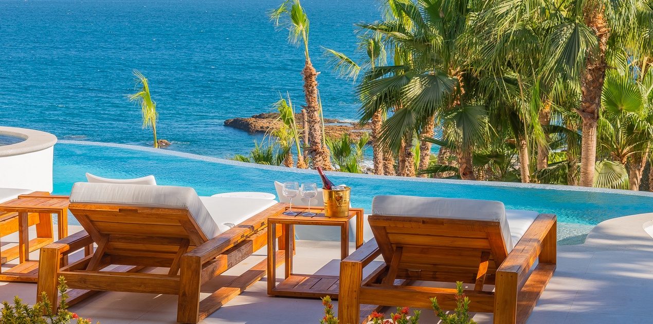 Poolside patio with ocean views