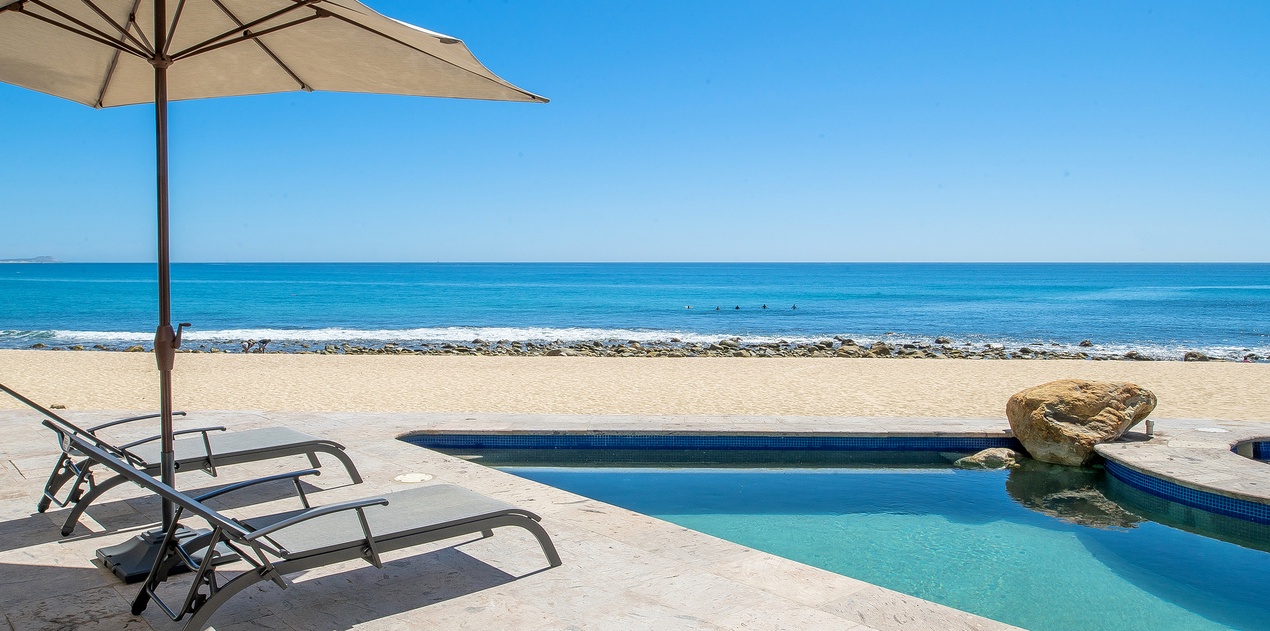 Incredible beachfront patio with pool and jacuzzi