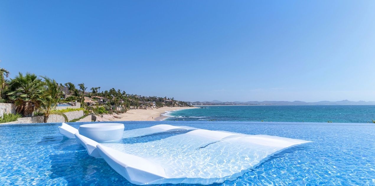 Poolside with incredible beachfront views
