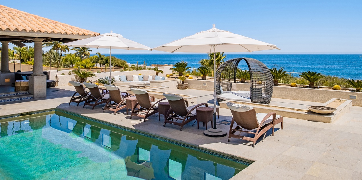 Sunny poolside with incredible ocean views
