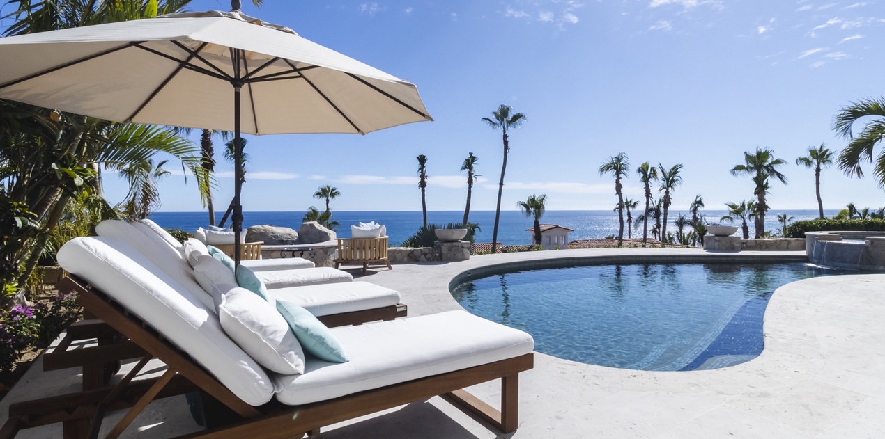 Poolside patio with ocean views