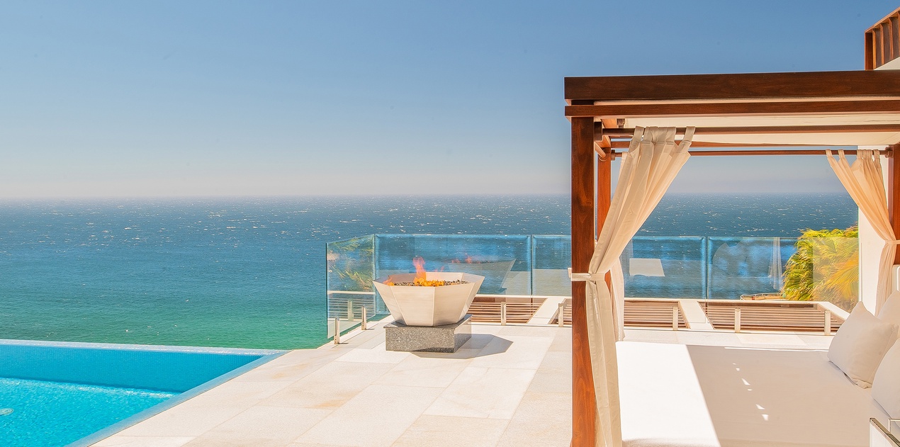 Patio with outdoor bed and ocean view -1