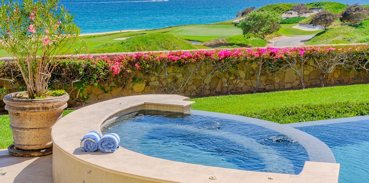 Poolside with incredible ocean and golf course views