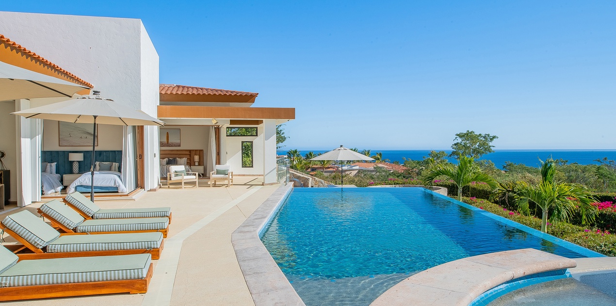 Gorgeous poolside patio with ocean view