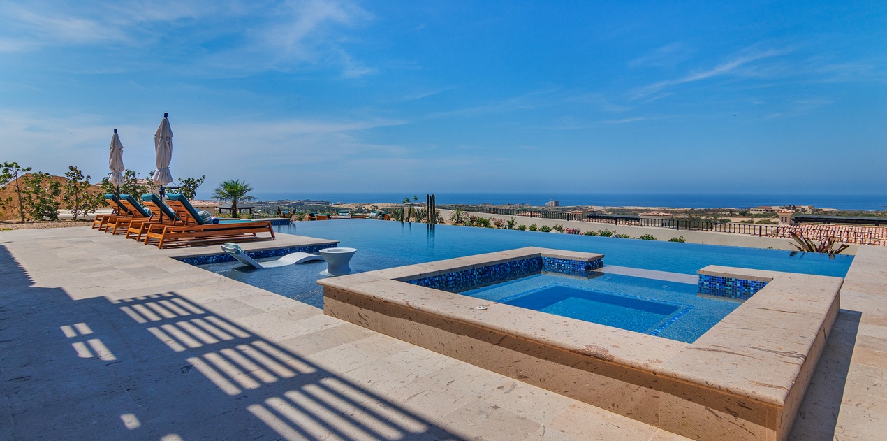 Poolside patio with ocean views