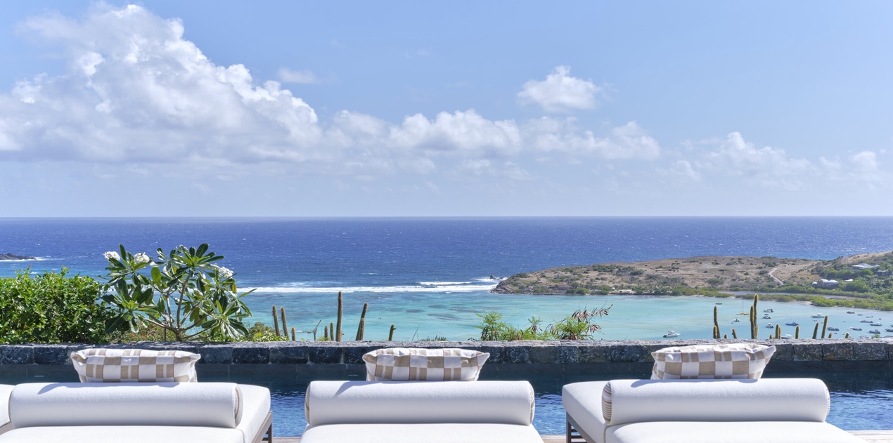 Stunning ocean views and turquoise waters create the perfect backdrop for your tropical getaway relaxation.