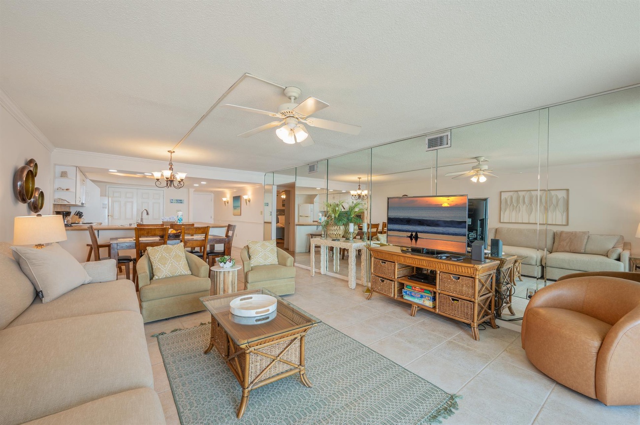 Relax in your spacious coastal retreat with ocean-inspired décor, comfortable seating, and an open layout perfect for gathering with loved ones.