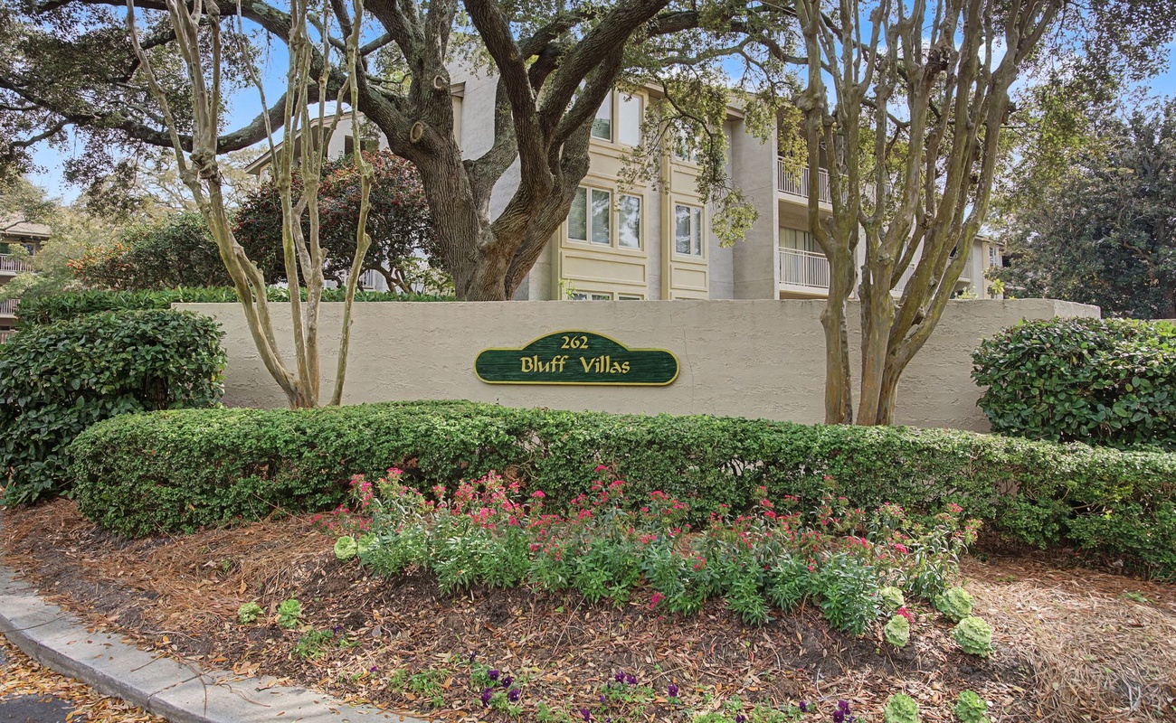 Welcome to Bluff Villas, where mature trees and manicured landscaping create a peaceful entrance to your home away from home.