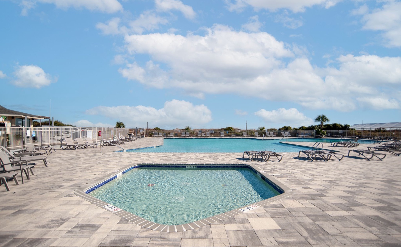 Sparkling pool and spa await your perfect day of relaxation under Florida's endless blue skies.