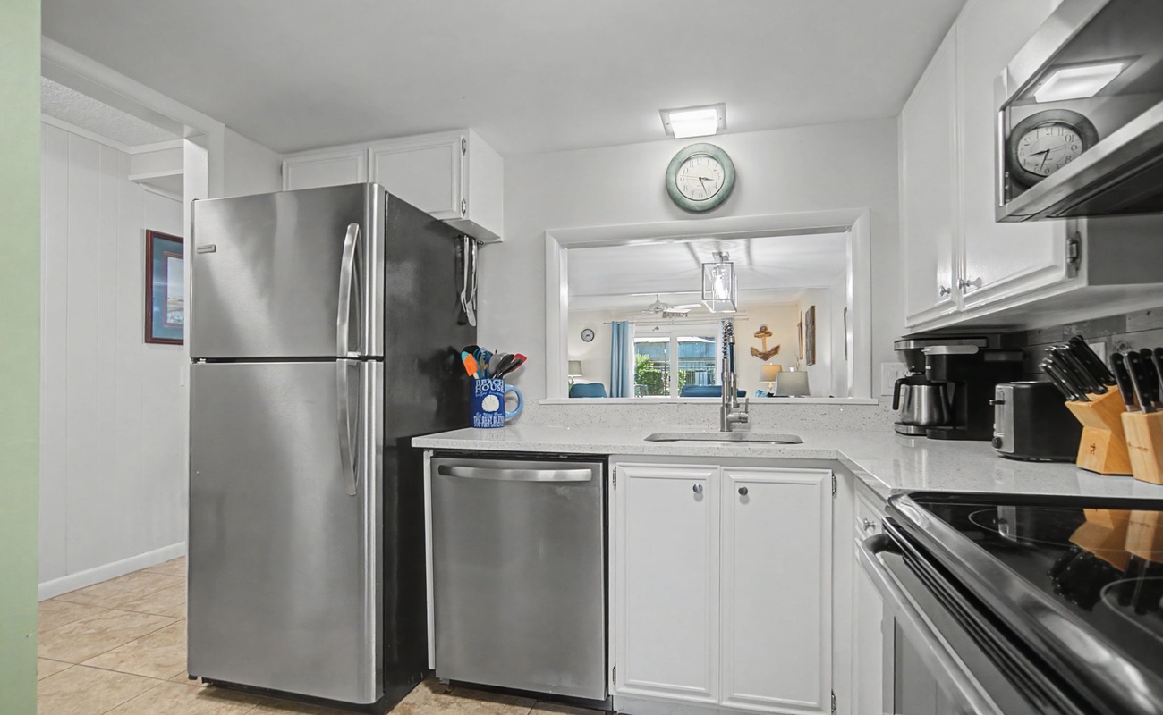 Your fully equipped kitchen features stainless steel appliances and granite countertops, perfect for preparing memorable meals during your stay.