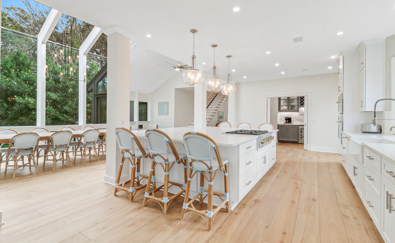 Your gourmet kitchen awaits with spacious marble counters, top-tier appliances, and bistro-style seating perfect for morning coffee or entertaining friends.