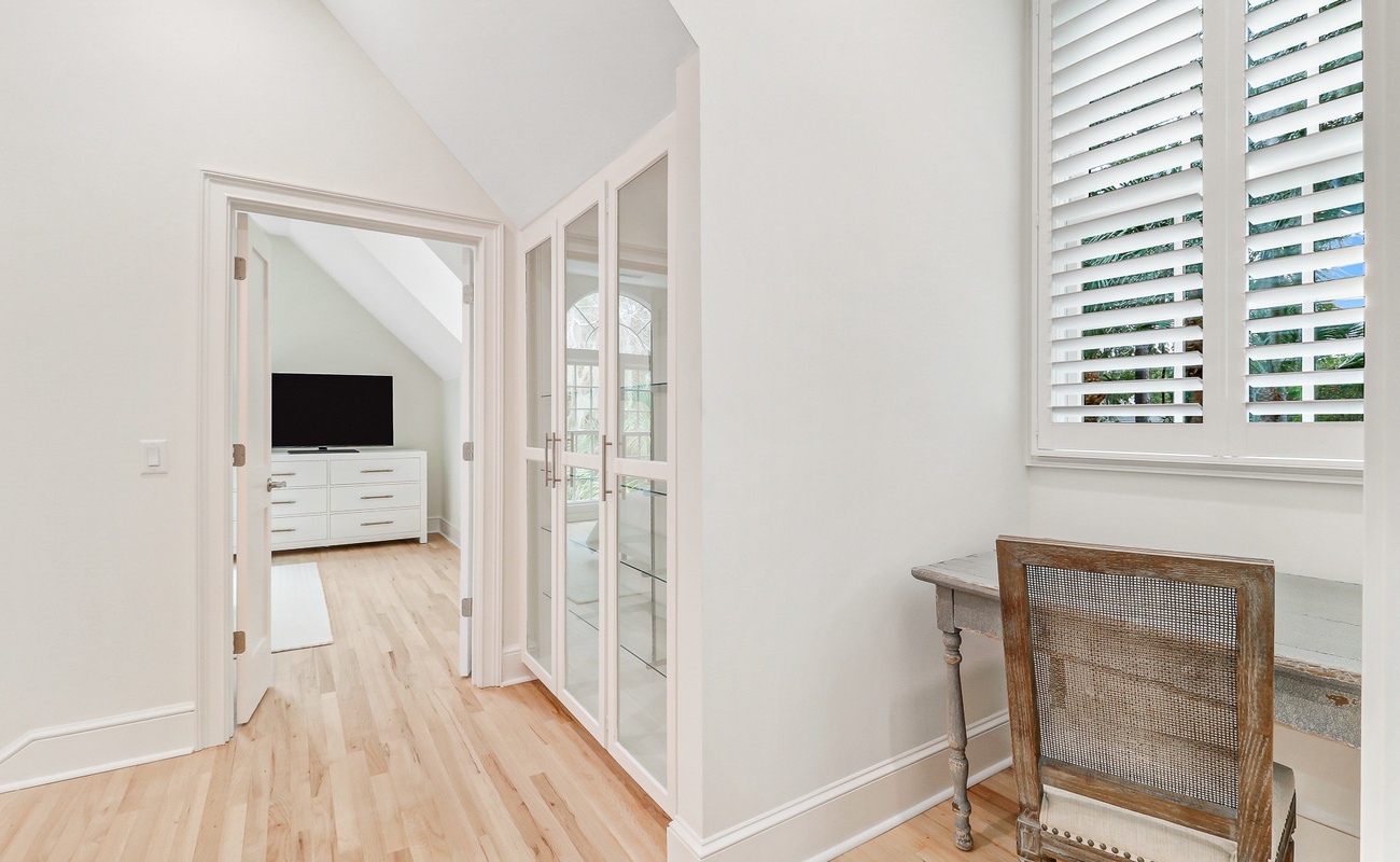 Step into your bright, airy retreat where hardwood floors and white shutters create the perfect blend of comfort and style.