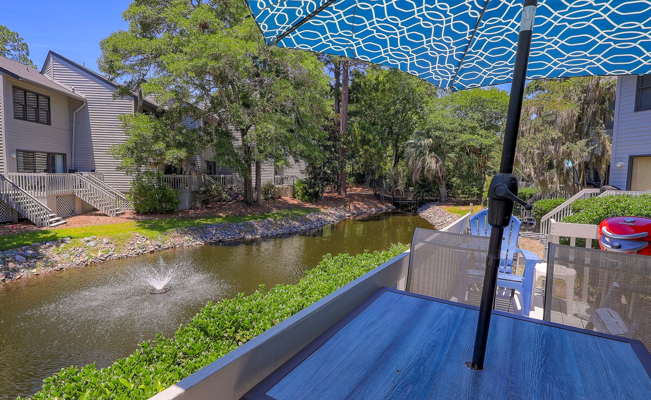 Porch with Lagoon Views and Private Charcoal Grill