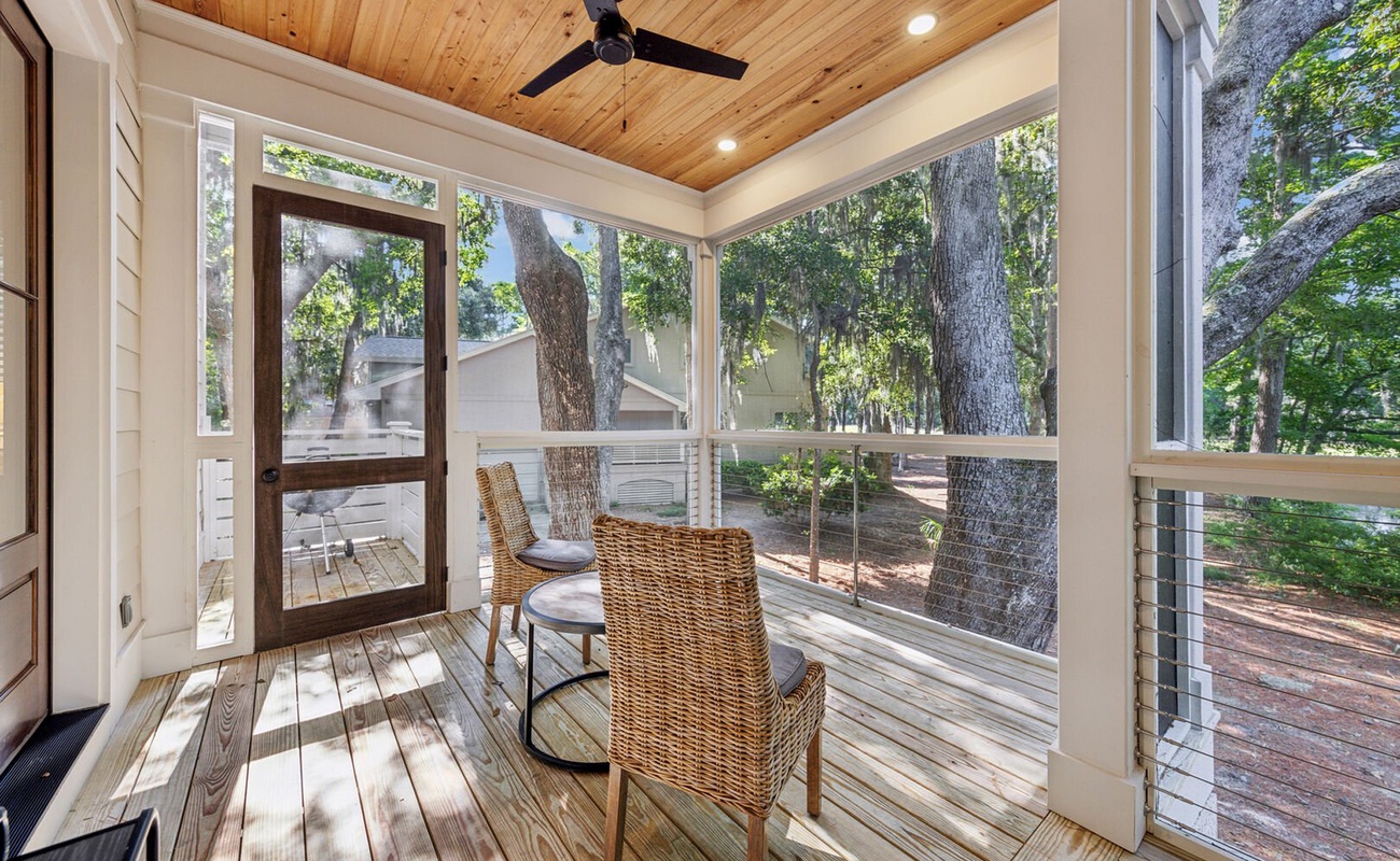 Screened Wraparound Porch with Views of Lagoon, Private Pool, and Glimpses of Golf Course