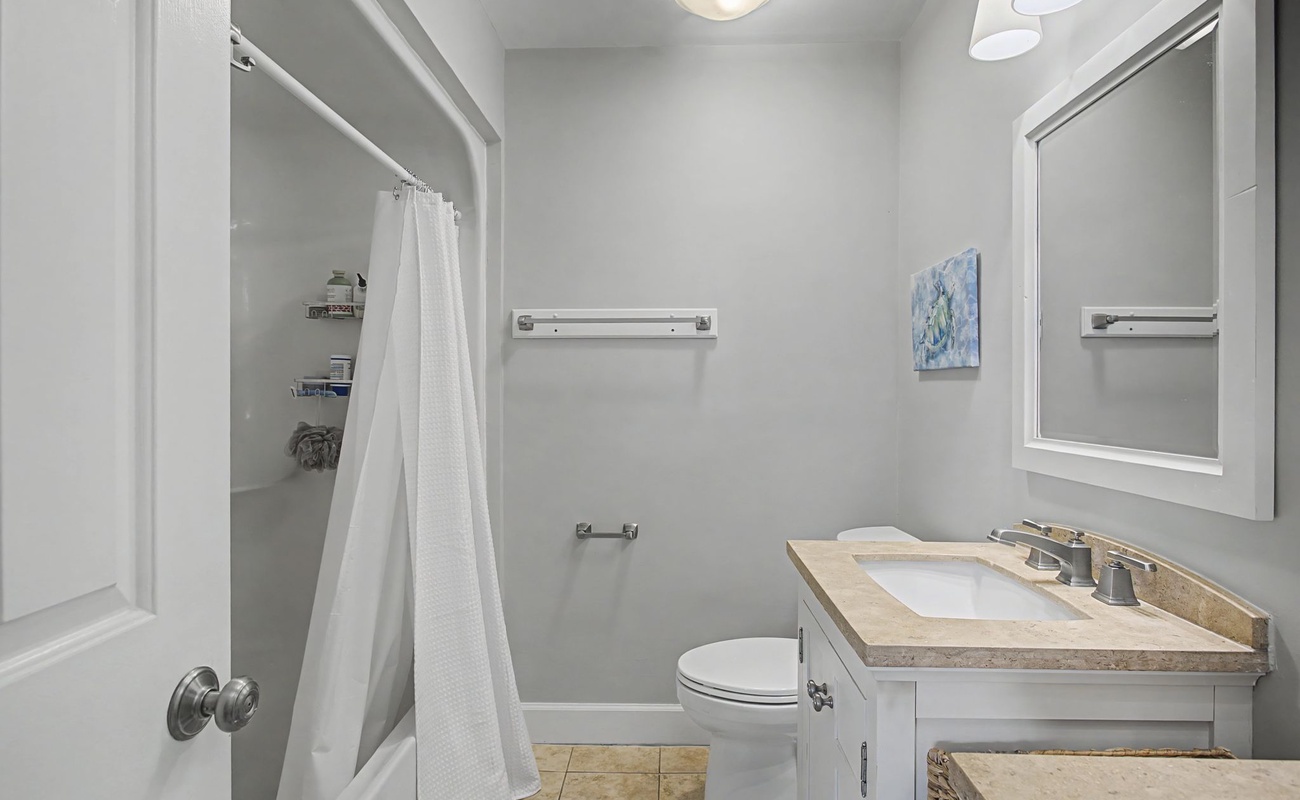 Refresh in your private bathroom with elegant marble counters, fluffy towels, and modern fixtures designed for your comfort.