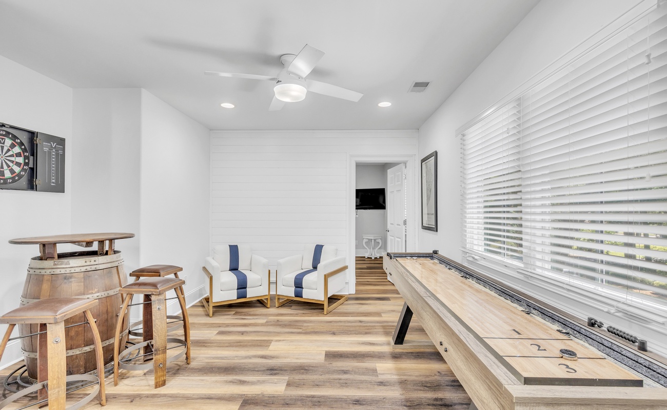 Landing with Seating and Shuffleboard Table (Dartboard not for guest use)