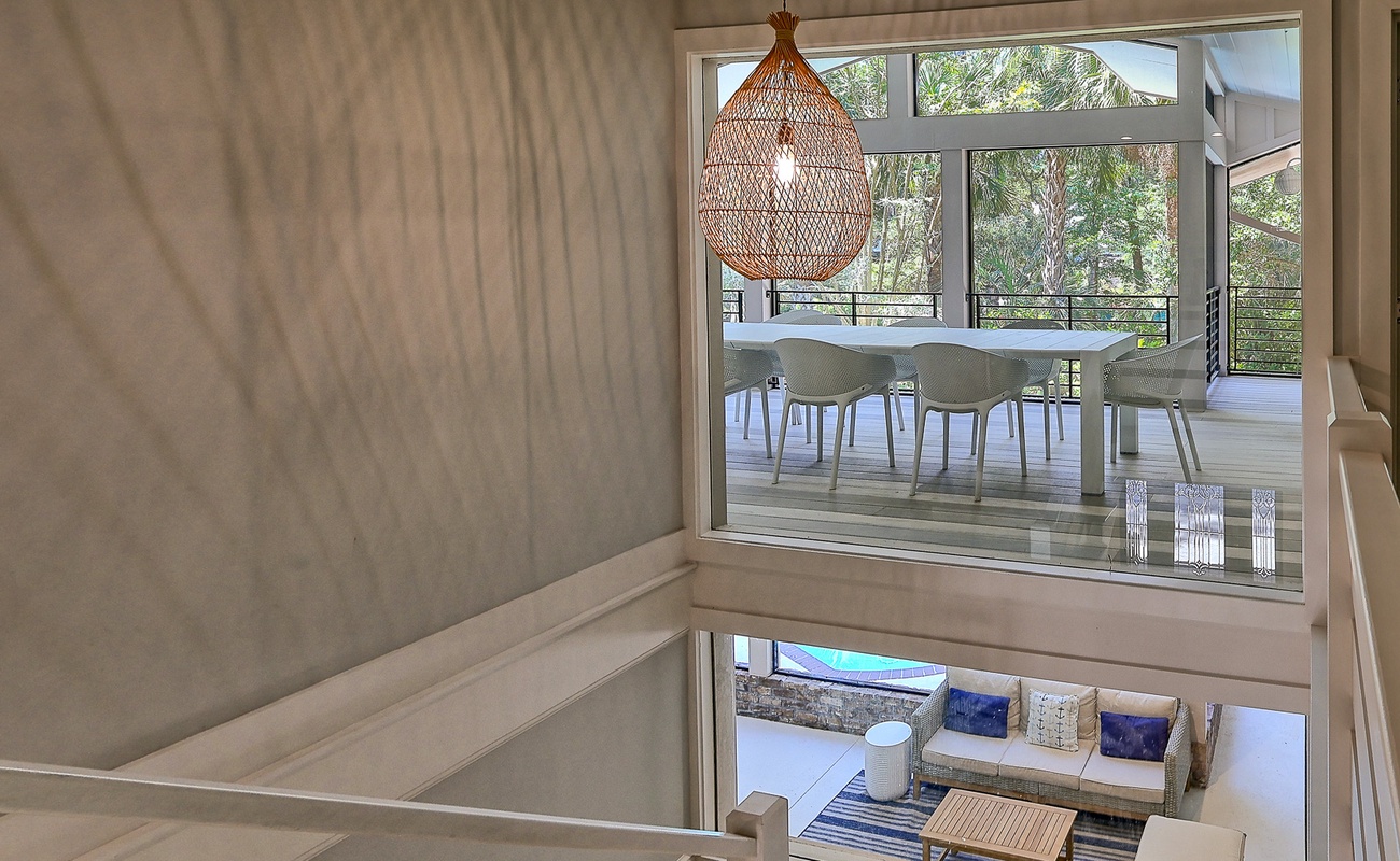 Stairwell Showing Both Screened-In Living Areas