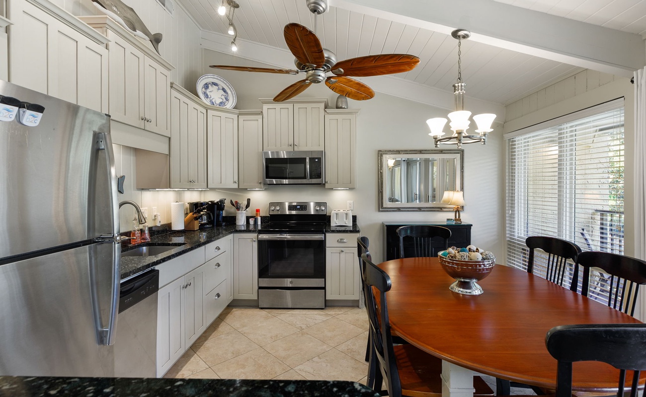 Your fully-equipped kitchen features granite counters, stainless appliances, and cozy dining nook for memorable meals together.