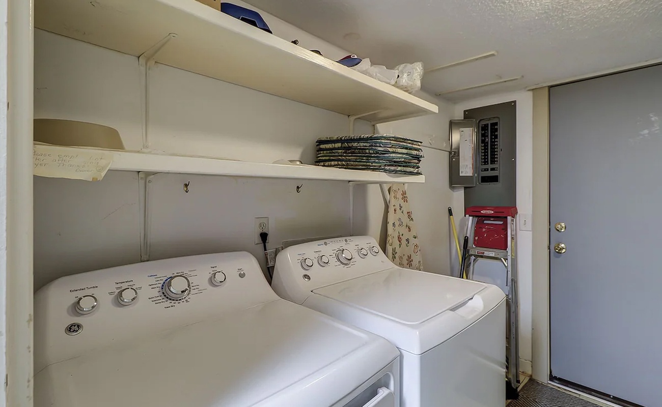 Your private laundry space keeps your vacation wardrobe fresh, with convenient shelving for all your travel essentials.