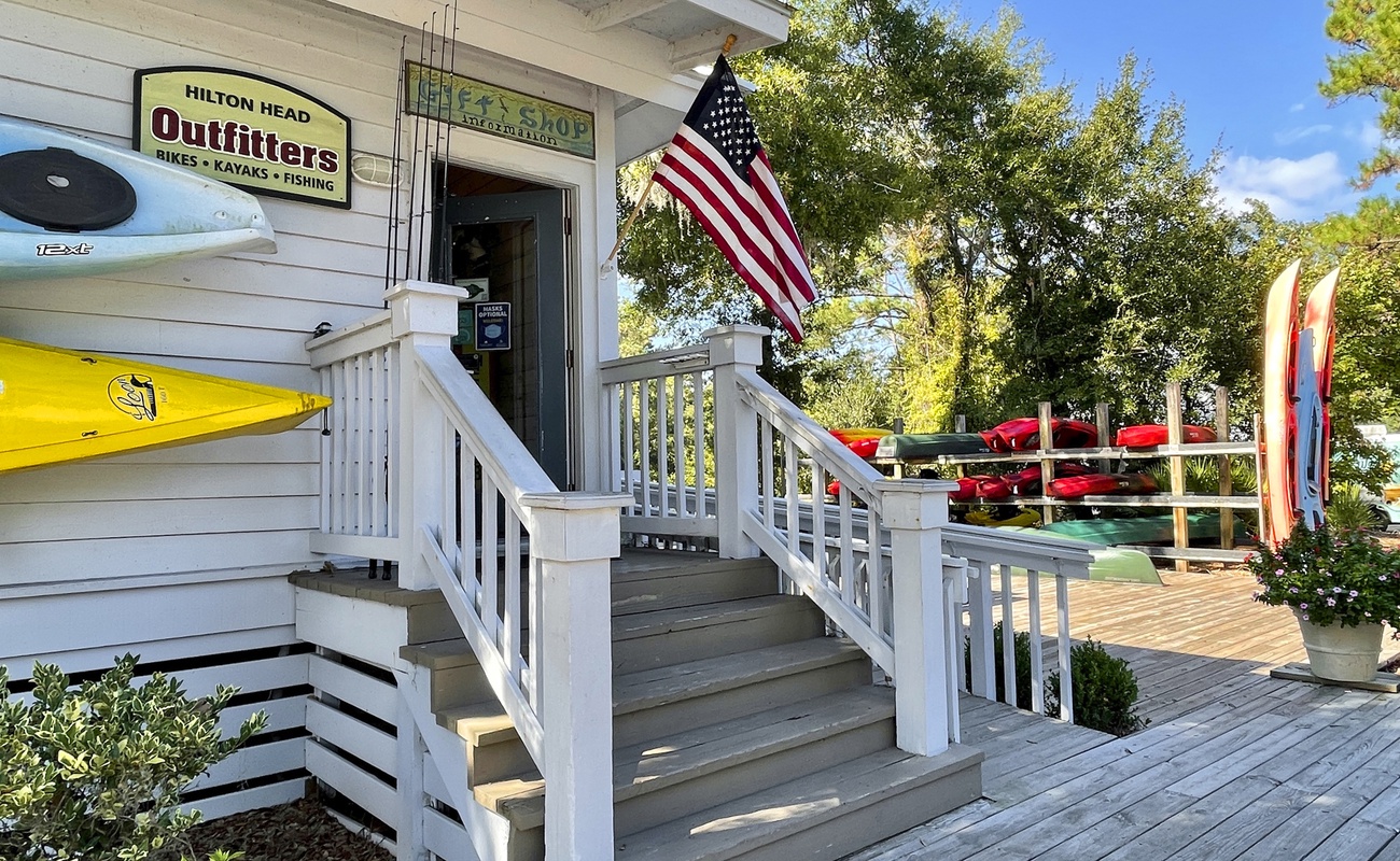 Waterfront property features a convenient outfitters shop for bikes, kayaks, and fishing gear with easy access to adventure rentals.