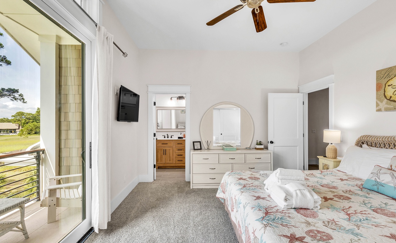 Upstairs Primary Suite with King Bed, En-Suite Bathroom, and Private Balcony