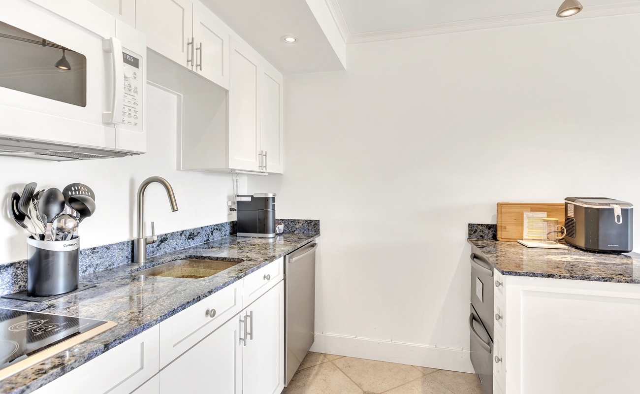 Your fully equipped kitchen features granite countertops, modern appliances, and everything you need to prepare meals during your stay.